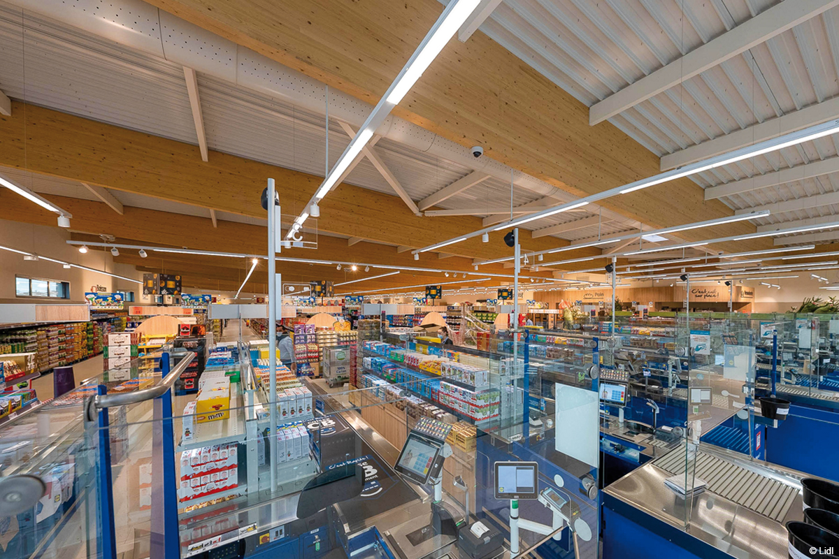 surface commerciale et espace de vente charpente en bois lamellé collé