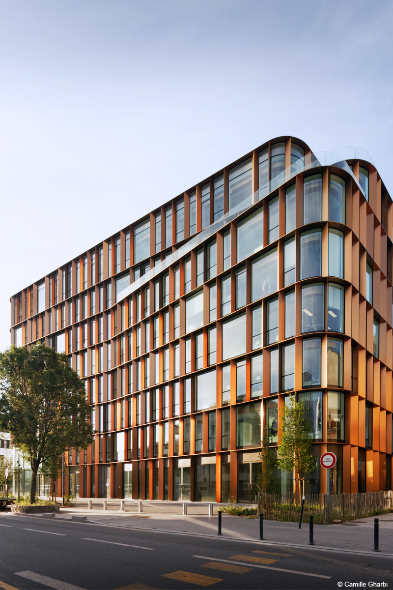 Curve Immeuble de bureaux en bois lamellé et béton bois lamellé cintré