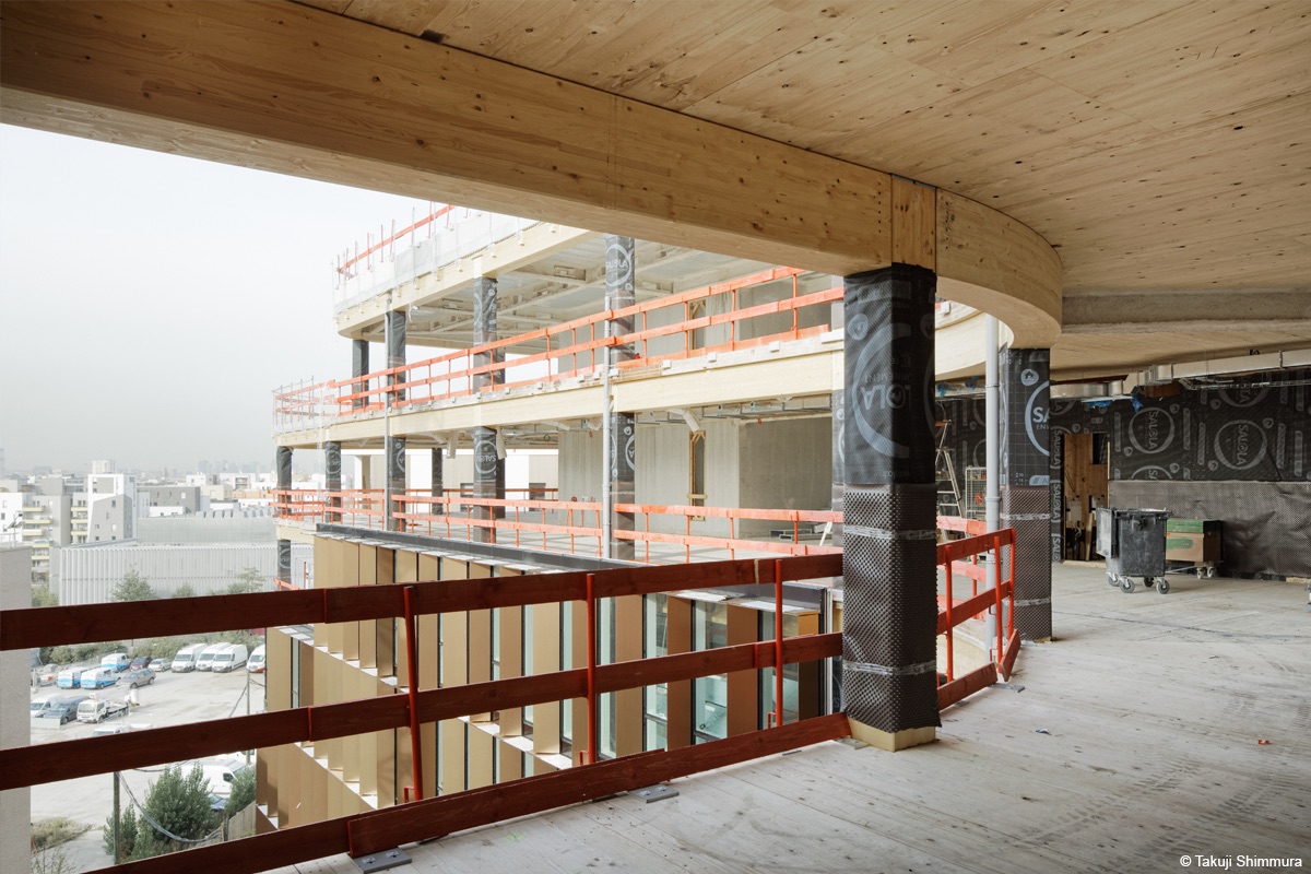 Curve Immeuble de bureaux en bois lamellé et béton bois lamellé cintré