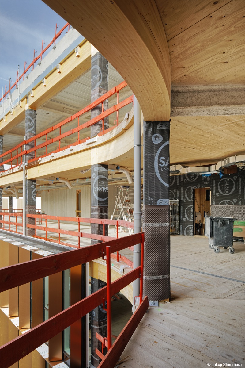 Curve Immeuble de bureaux en bois lamellé et béton bois lamellé cintré